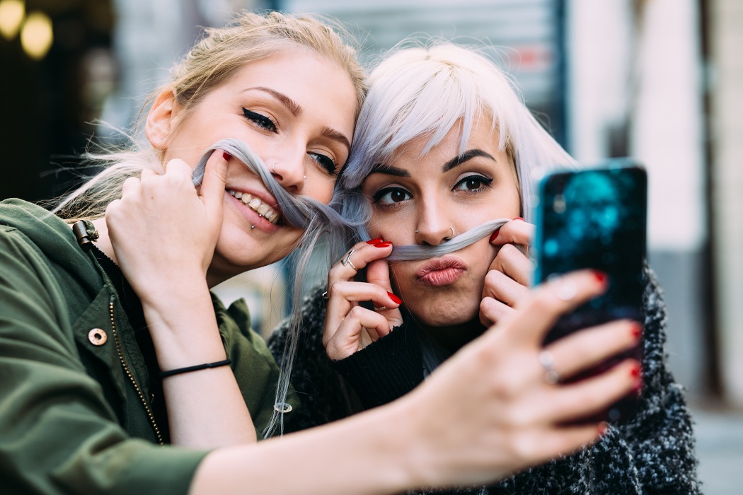 Millennials taking a selfie