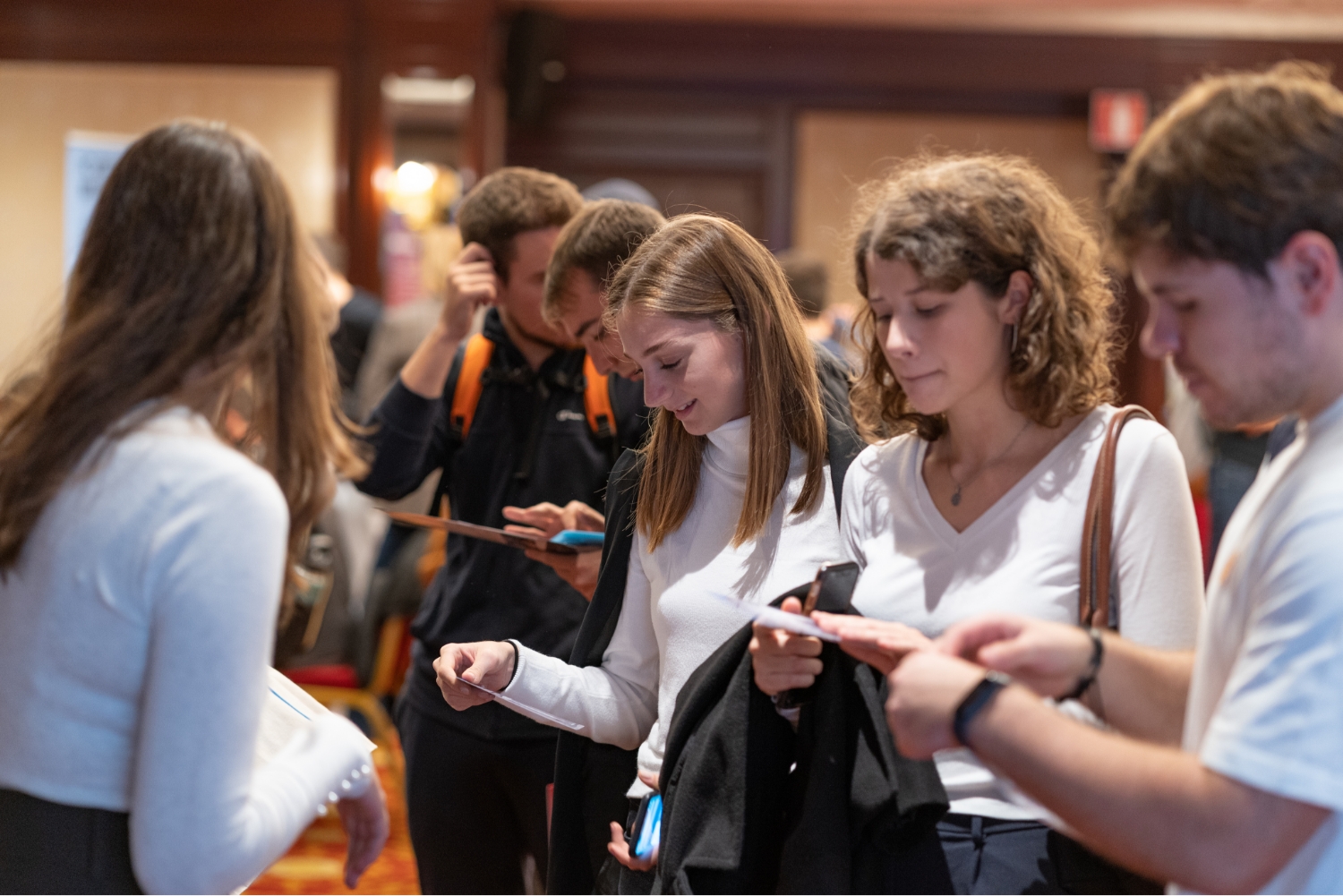 A prospective student at a student recruitment event.