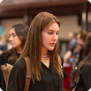 A prospective student at a student recruitment event.