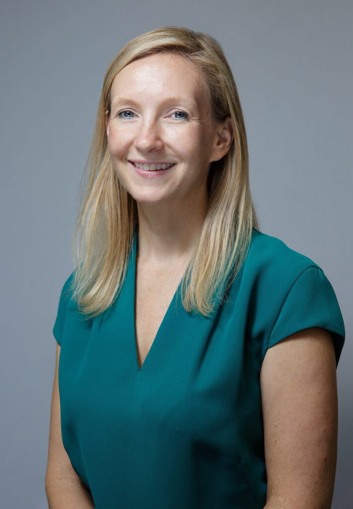 A profile photo of Claire Whittingham in a green top.