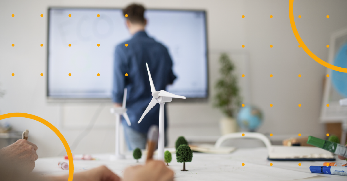 A model wind turbine in a meeting room, evidencing sustainability.