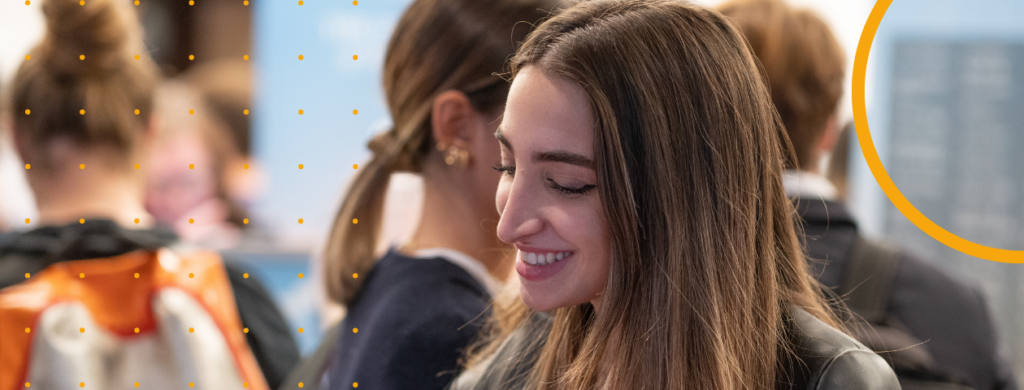 A student at a student recruitment fair.