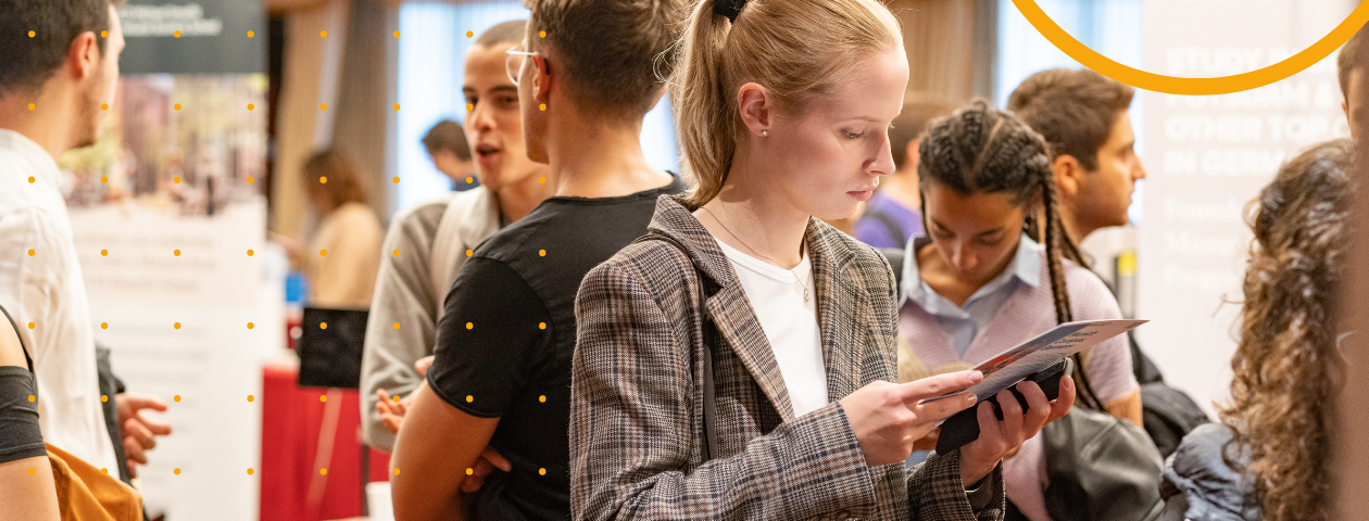 A student at a student recruitment fair