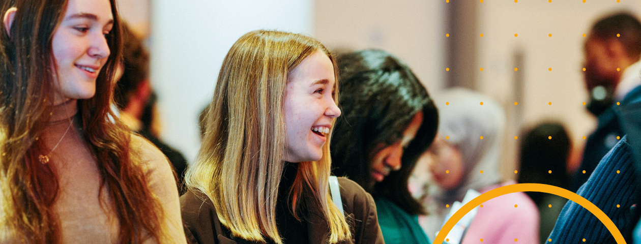 Students at a student recruitment fair.